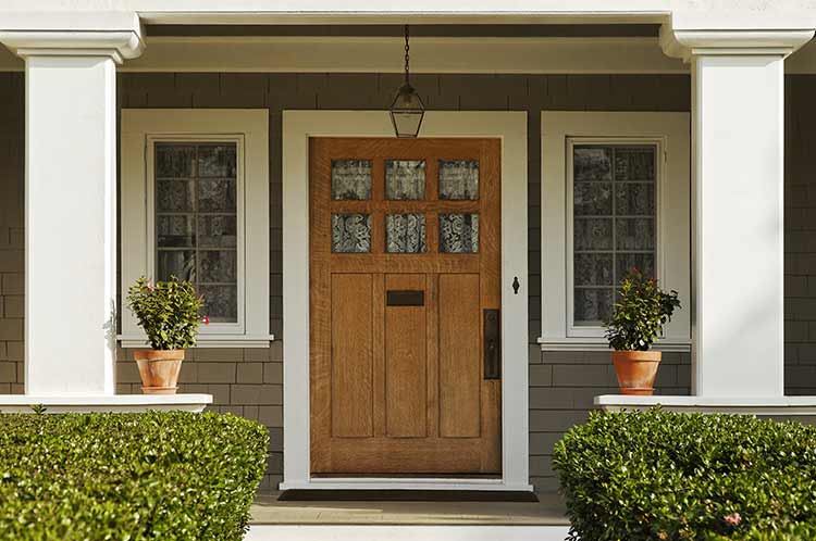 The front door of a home protected by Physical Home Defense