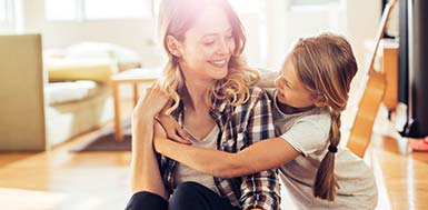 A mother and daughter safe inside their home